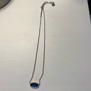 Kendra Scott necklace with navy blue pendant